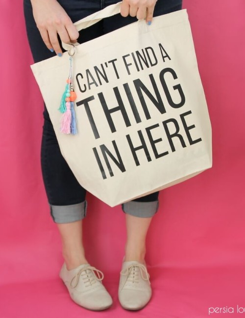 Super cute bag is super easy to make with heat transfer vinyl. Beaded tassels add a fun touch. (Plus dozens of other vinyl projects with Expressions Vinyl!)