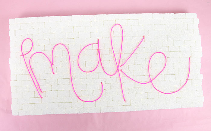 DIY brick and neon sign - so easy to make! No special tools required. Make whatever word or phrase you like