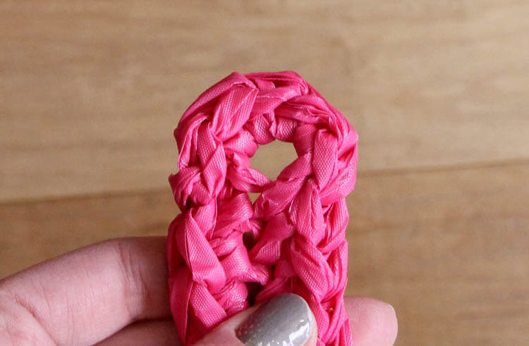 crochet an easter basket out of plastic yarn! Make your own colorful plastic yarn from old party tablecloths