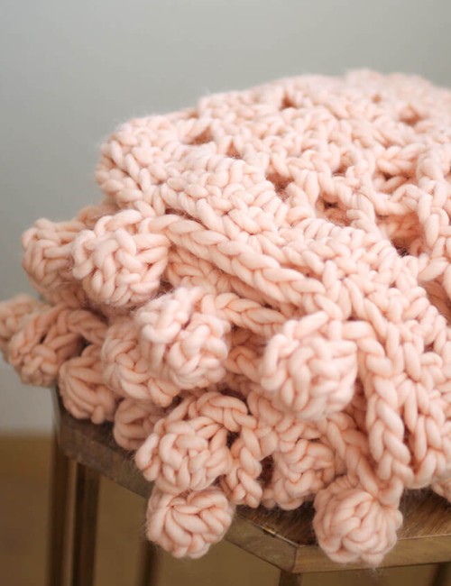 Crochet this gorgeous crocheted blanket easily and quickly with a kit from We Are Knitters.