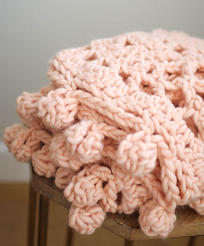 Crochet this gorgeous crocheted blanket easily and quickly with a kit from We Are Knitters.