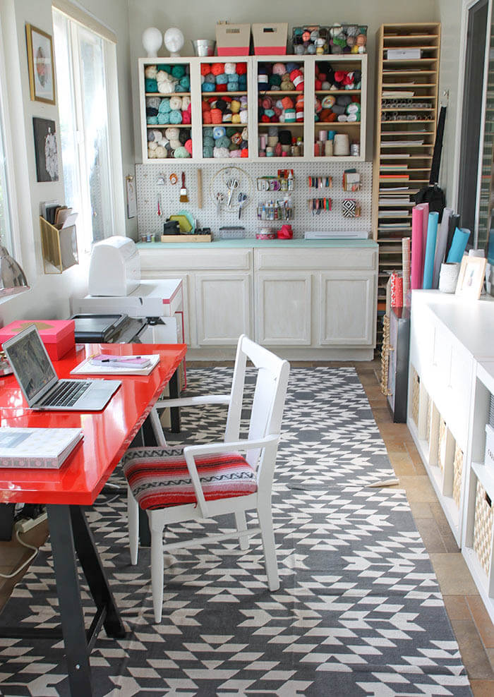 A colorful and organized craft room - lots of fun storage ideas!