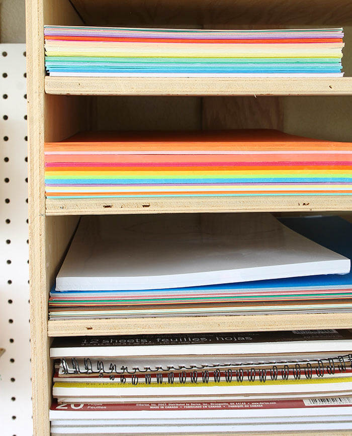 A colorful and organized craft room - lots of fun storage ideas!