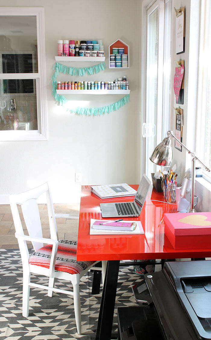 A colorful and organized craft room - lots of fun storage ideas!