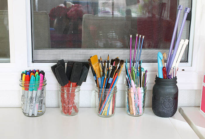 A colorful and organized craft room - lots of fun storage ideas!