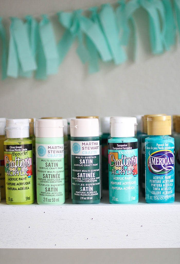 A colorful and organized craft room - lots of fun storage ideas!