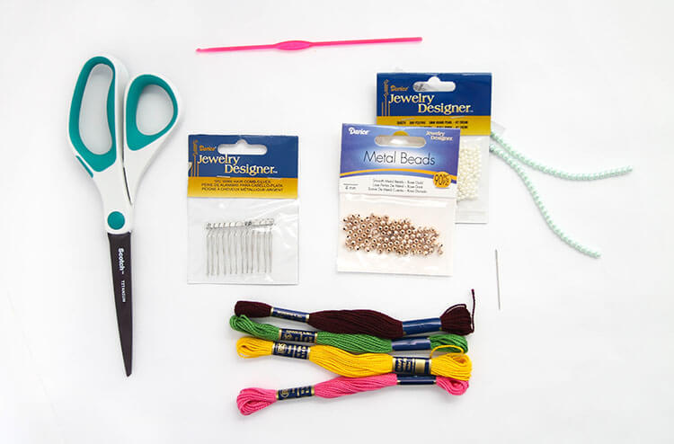 Make your own pretty Crochet Flower Hair Combs with tiny crocheted flowers. Free crochet pattern and photo tutorial.