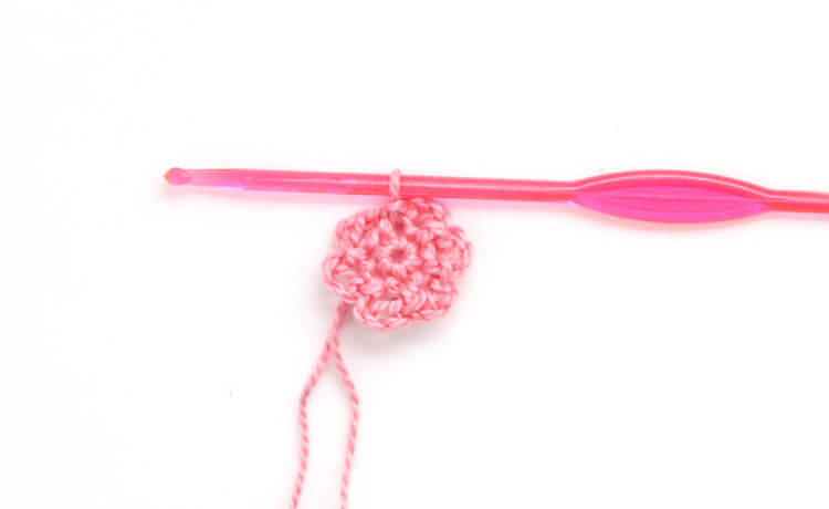 Make your own pretty Crochet Flower Hair Combs with tiny crocheted flowers. Free crochet pattern and photo tutorial.