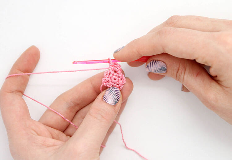 Make your own pretty Crochet Flower Hair Combs with tiny crocheted flowers. Free crochet pattern and photo tutorial.