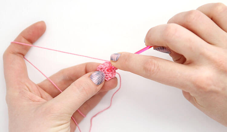 Make your own pretty Crochet Flower Hair Combs with tiny crocheted flowers. Free crochet pattern and photo tutorial.