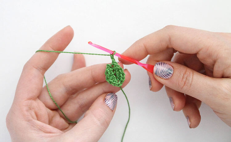 Make your own pretty Crochet Flower Hair Combs with tiny crocheted flowers. Free crochet pattern and photo tutorial.