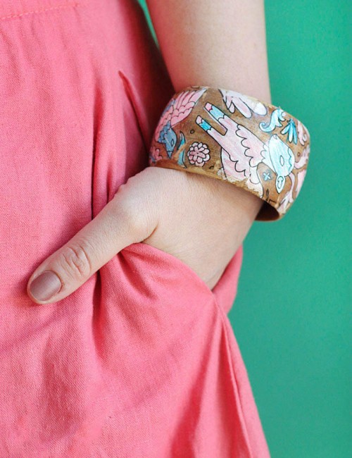 Make your own DIY coloring page bracelets. Turn your coloring book or your kids' artwork into a piece of jewelry! Perfect DIY Mother's Day Bracelets!