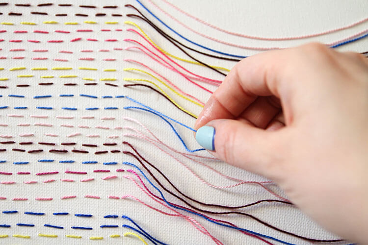 make your own unique embroidered canvas art - it's simple to make and has interesting texture and movement - free step-by-step tutorial