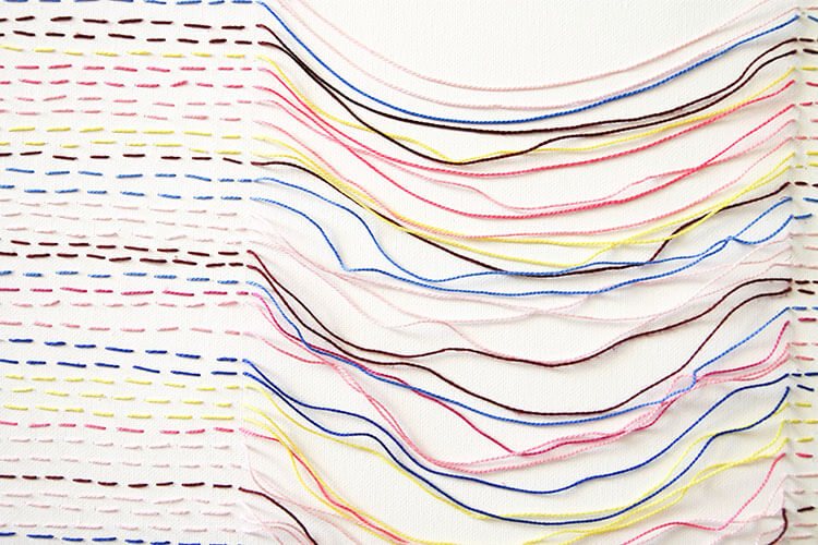 make your own unique embroidered canvas art - it's simple to make and has interesting texture and movement - free step-by-step tutorial