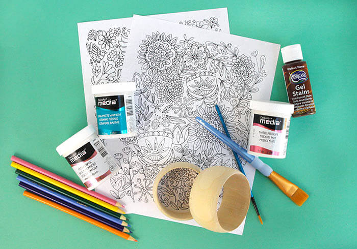 Make your own DIY coloring page bracelets. Turn your coloring book or your kids' artwork into a piece of jewelry! Perfect DIY Mother's Day Bracelets!