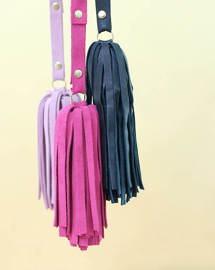 DIY Leather Tassel - these cute floppy suede tassels are fun to make and are a nice little gift. Video tutorial