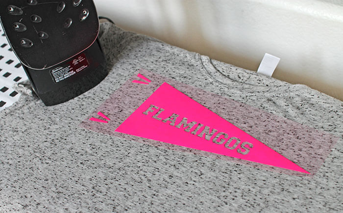 Make your own Neon Pennant Shirt for yarn, flamingos, or whatever you are enthusiastic about. Free Silhouette cut file and tutorial