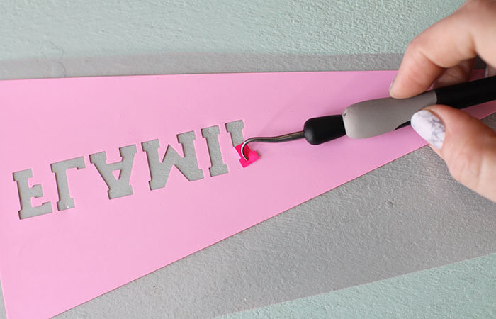 Make your own Neon Pennant Shirt for yarn, flamingos, or whatever you are enthusiastic about. Free Silhouette cut file and tutorial