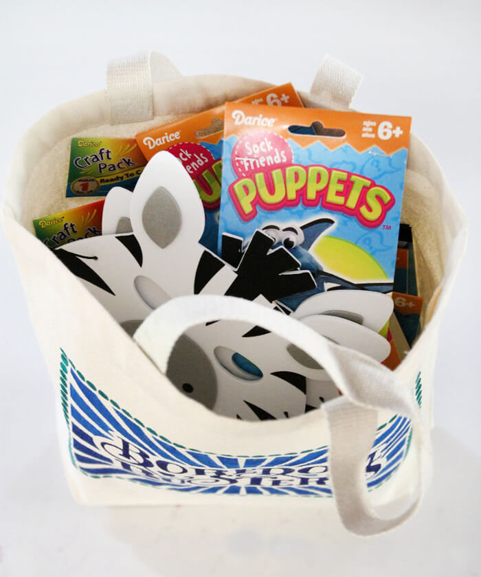 kids boredom busters bag full of craft kits and activities