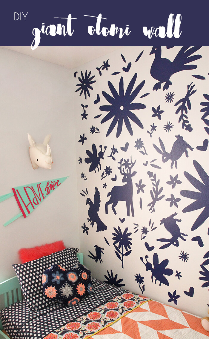 Awesome Otomi accent wall using DIY vinyl decals - so cool! 
