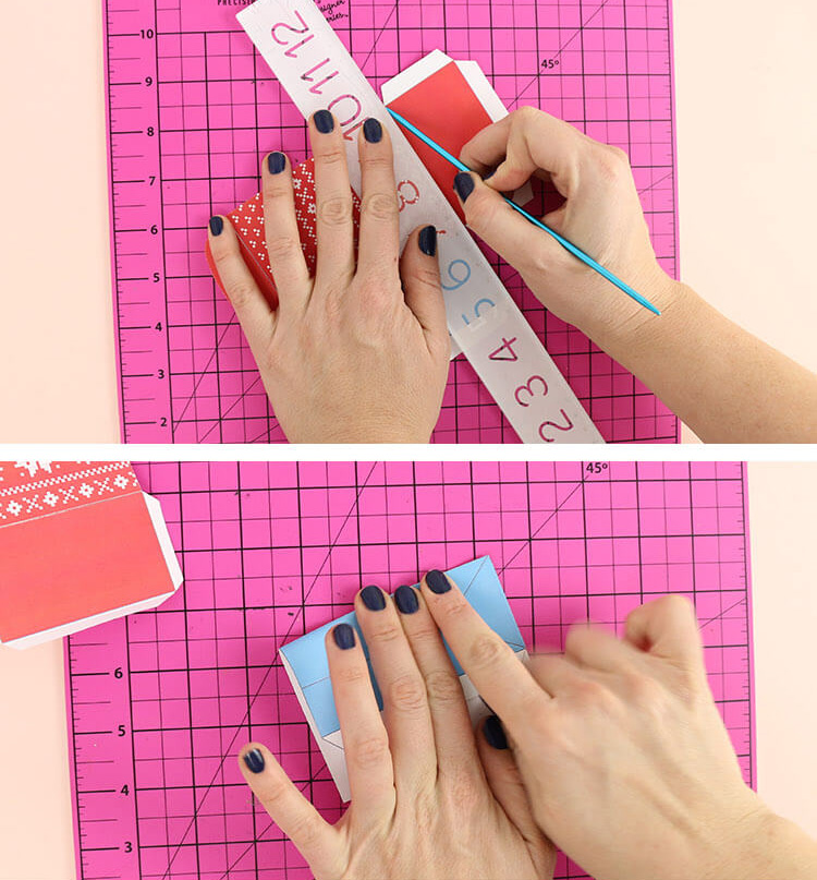 scoring along fold lines with knitting needle and straight edge