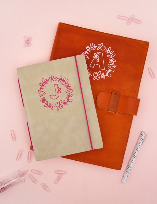diy monogram leather notebooks - custom vinyl monograms applied to leather - free silhouette and cricut cut files