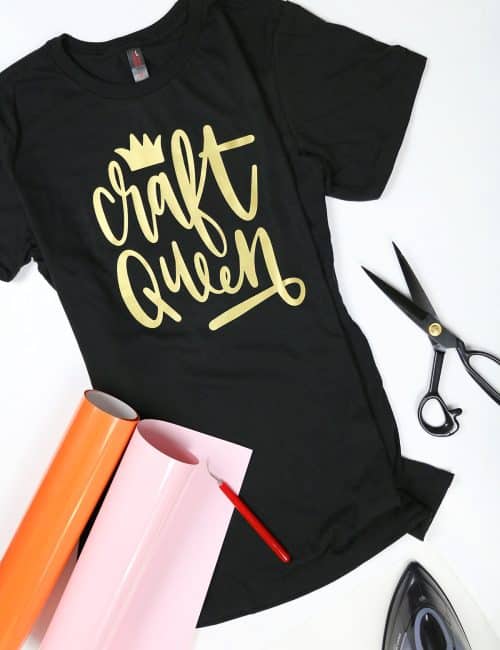 craft queen t-shirt with iron on vinyl design surrounded by iron and heat transfer vinyl