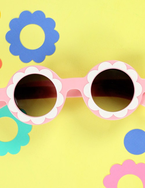 finished diy flower sunglasses on table