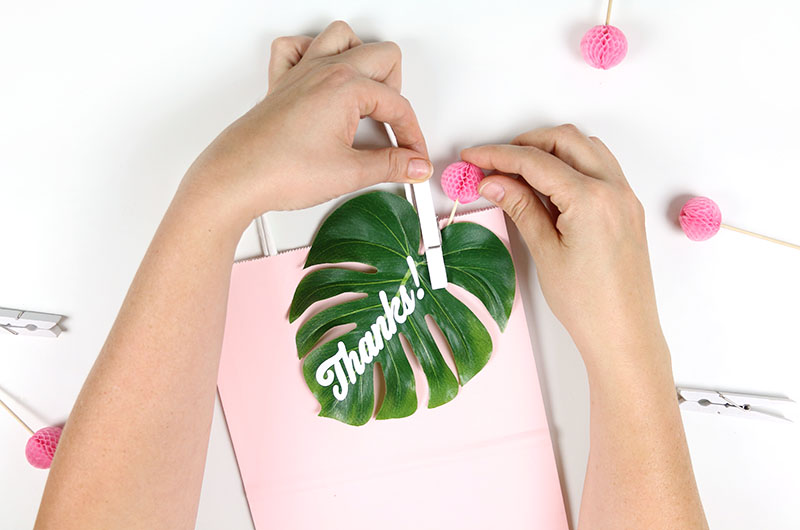 attach to tropical leaf to party favor gift bag