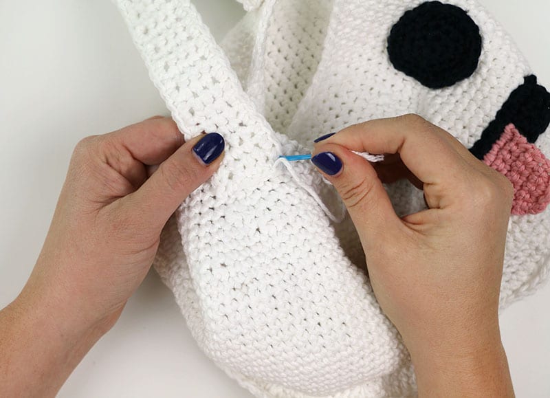 sew handle onto ghost crochet bag