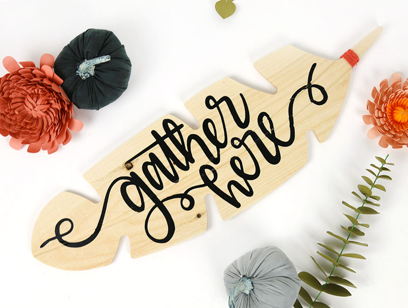gather here wooden feather sign