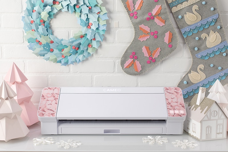 pink patterned silhouette cameo 4 with christmas decorations