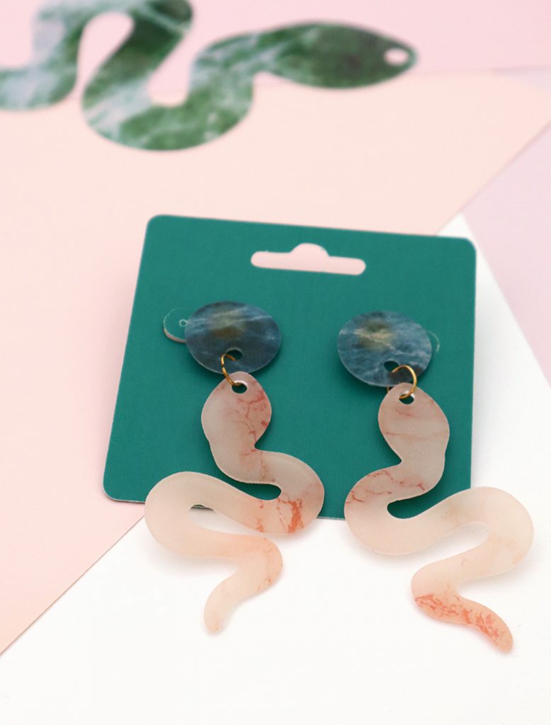 finished pink marble snake shaped shrink plastic earrings