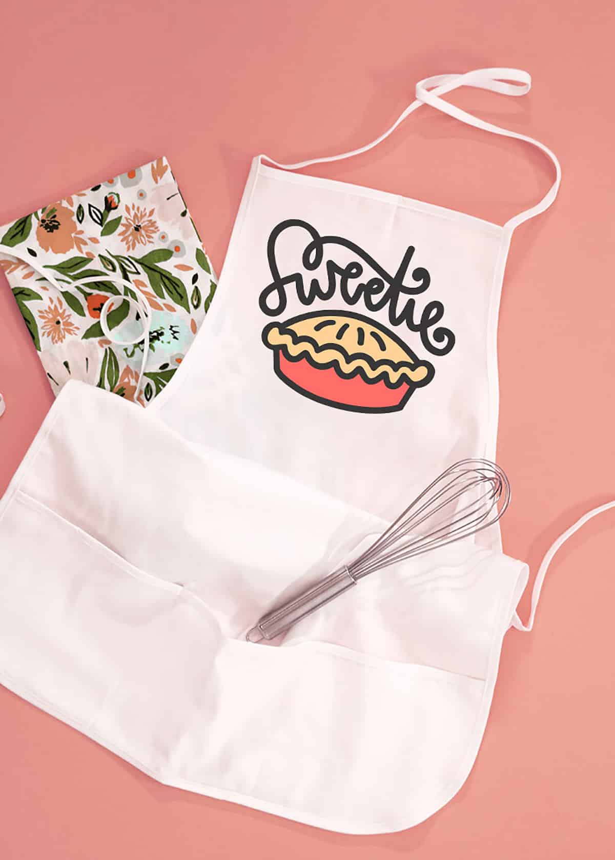 apron with sweetie pie svg design on it