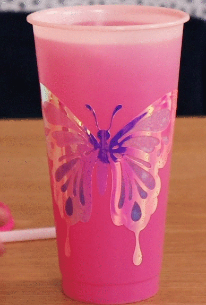 butterfly design on pink tumbler changing to blue