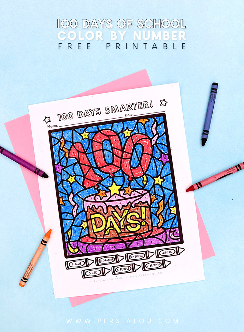 A colored 100 Days of School coloring page is laying on a light blue background surrounded by crayons.