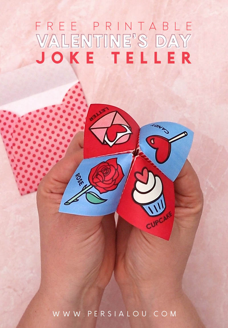 hands holding valentine cootie catcher