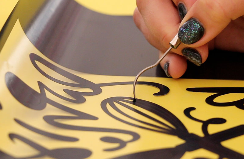 Removing excess vinyl from cut design