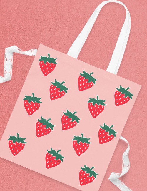 pink tote bag with strawberry svg iron on designs