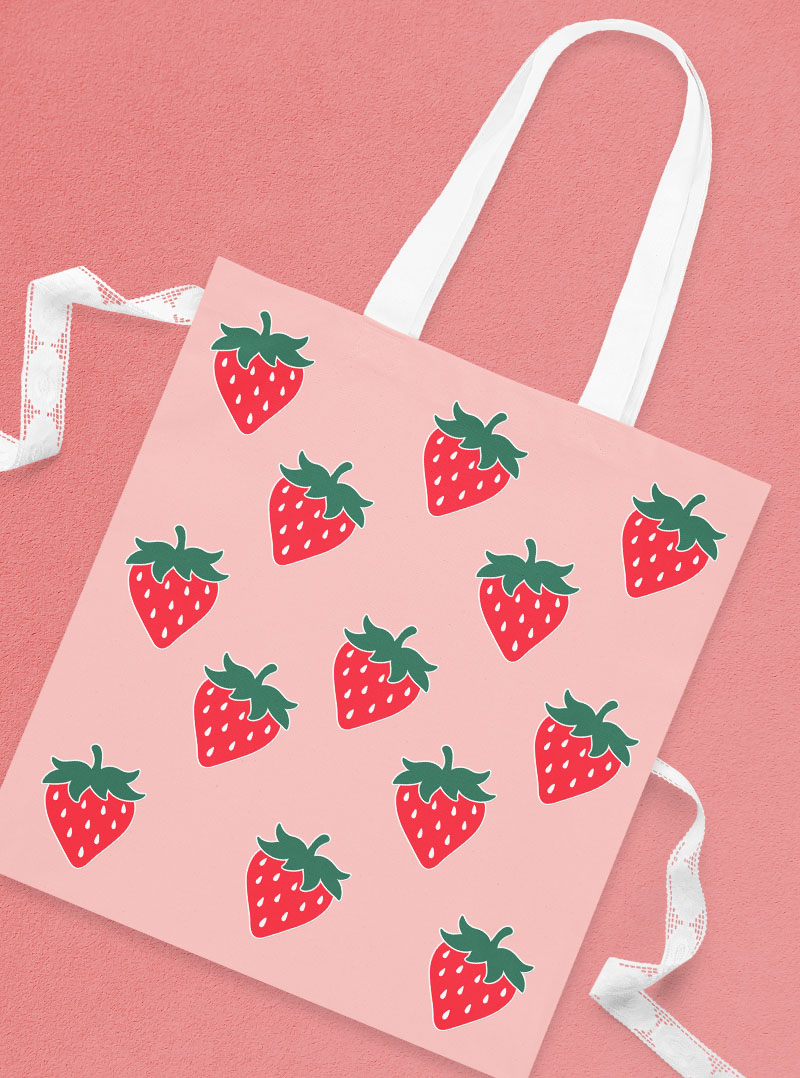 pink tote bag with strawberry svg iron on designs
