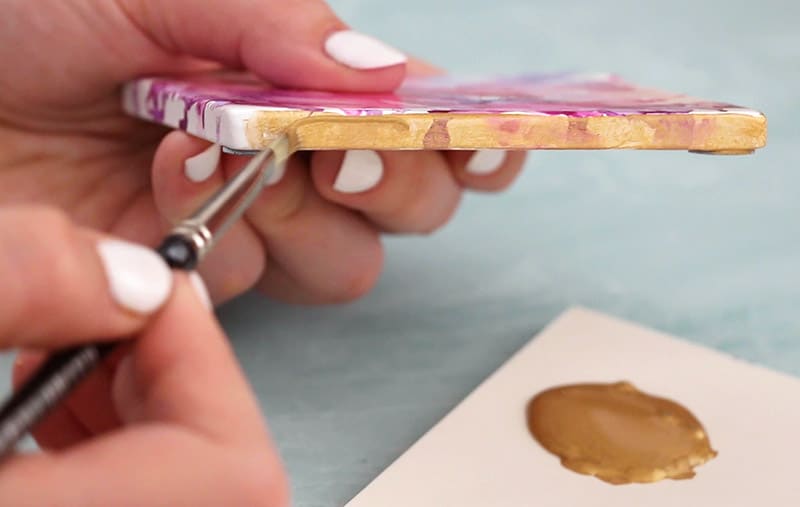 painting edges of alcohol ink coasters