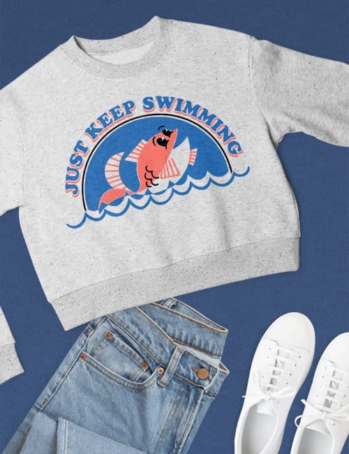 sweatshirt with just keep swimming svg fish design